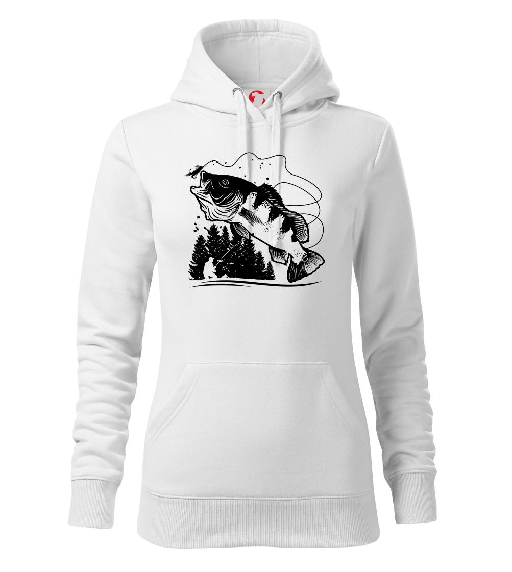 Rybář na břehu rybníka muškaří