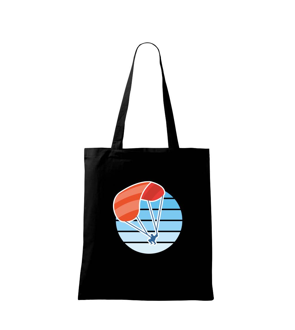 Paragliding oranžový v modrém kolečku