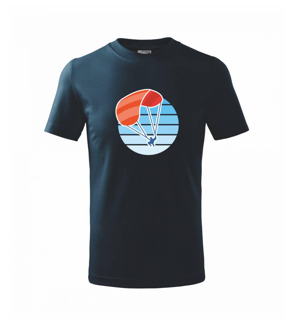 Paragliding oranžový v modrém kolečku