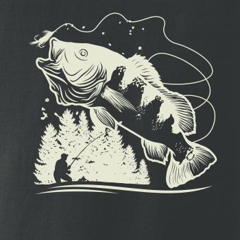 Rybář na břehu rybníka muškaří