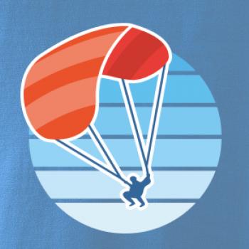 Paragliding oranžový v modrém kolečku