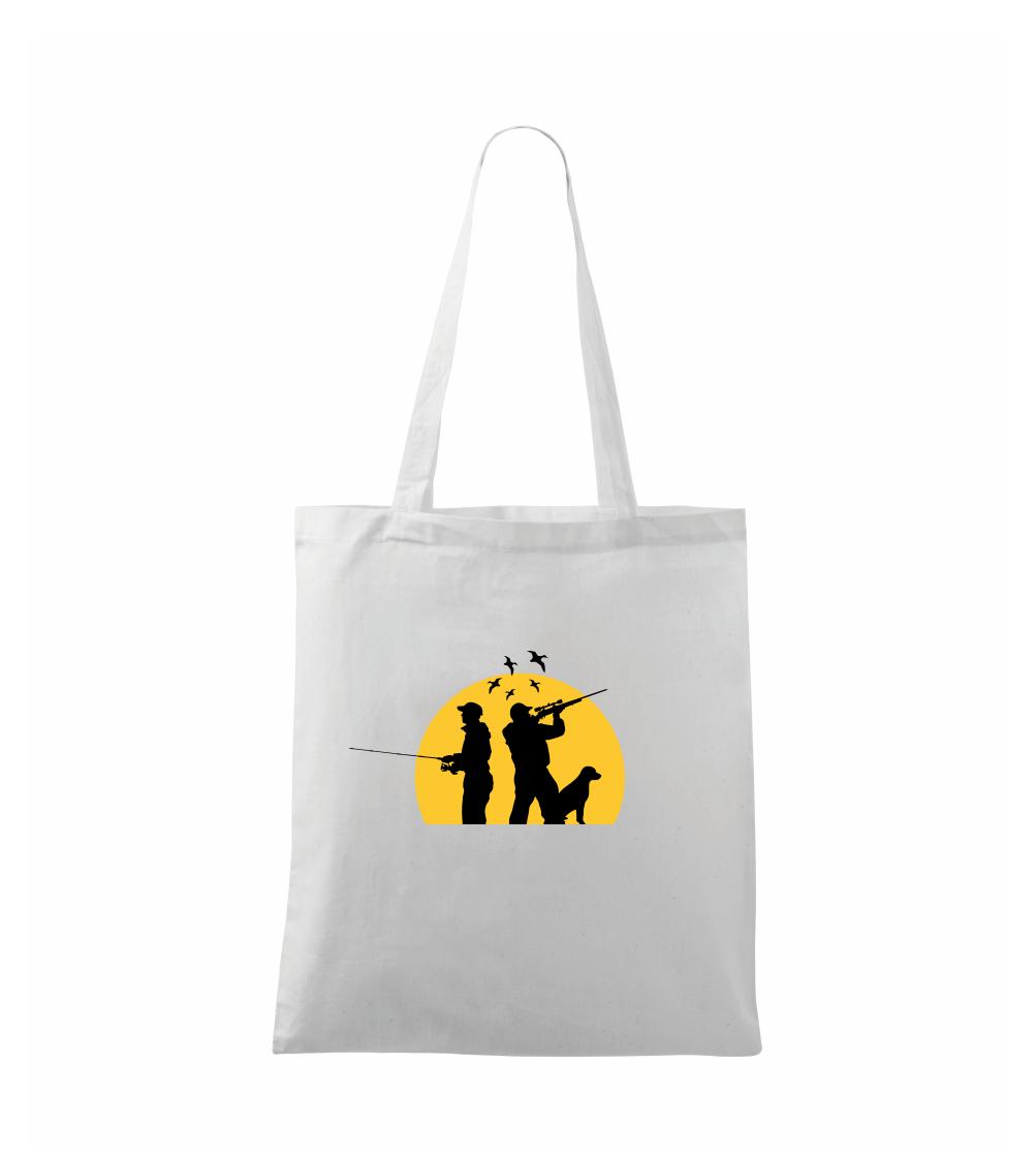 Lovec při západu slunce