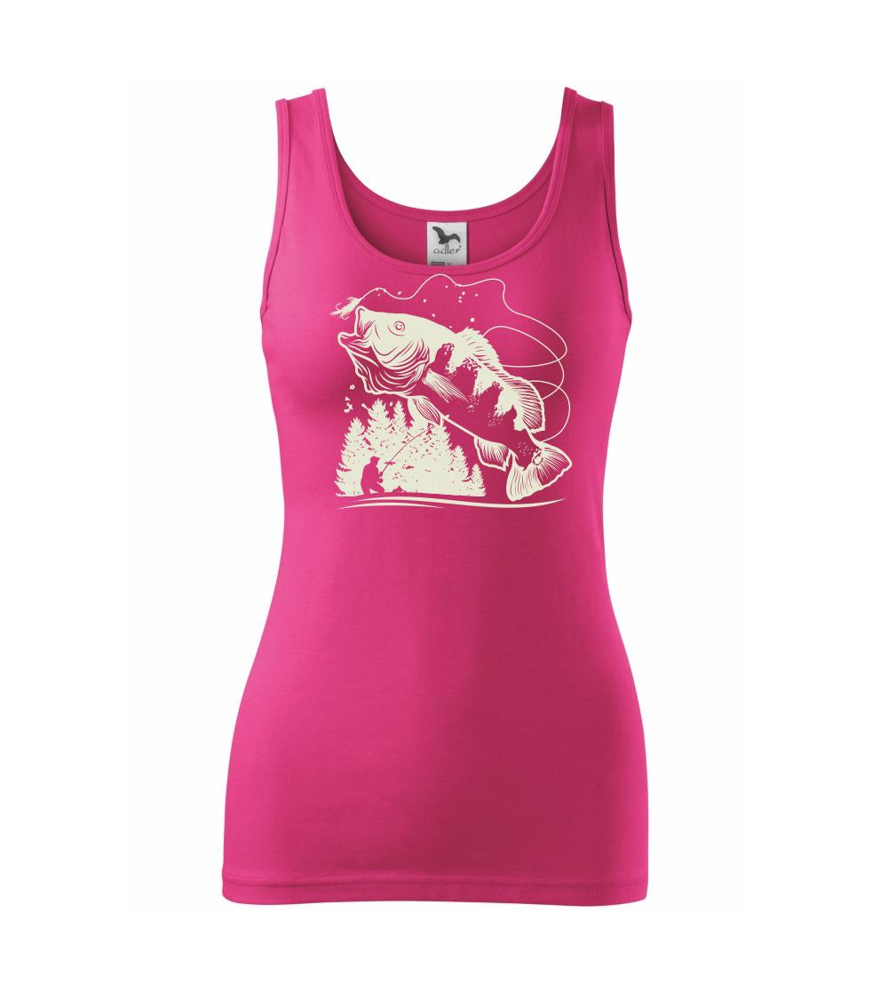 Rybář na břehu rybníka muškaří