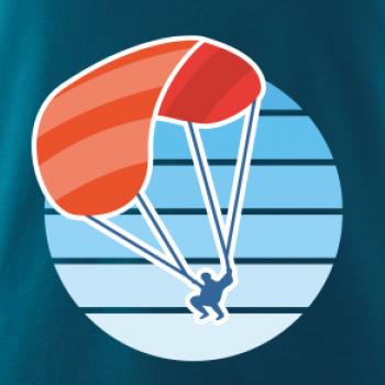 Paragliding oranžový v modrém kolečku