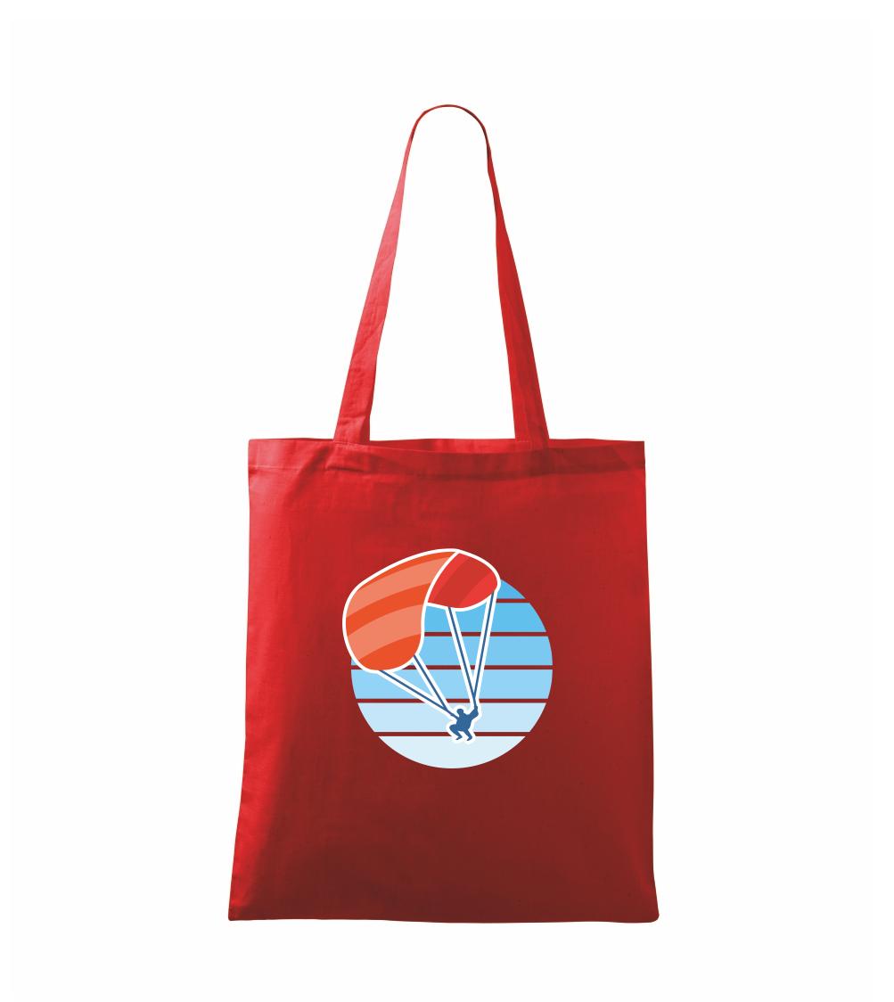 Paragliding oranžový v modrém kolečku