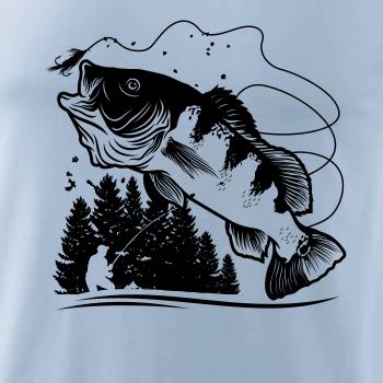 Rybář na břehu rybníka muškaří