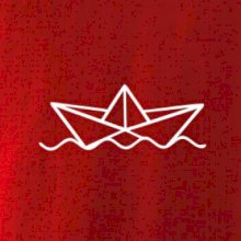 Papírová loďka na vodě