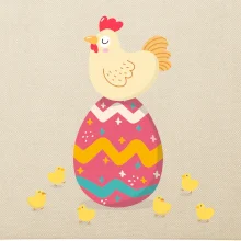 Slepice sedící na velikonočním vejci