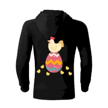 Slepice sedící na velikonočním vejci