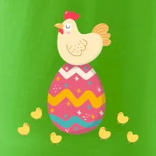 Slepice sedící na velikonočním vejci