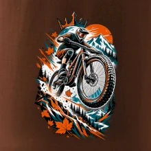 Listopadový horský cyklista při adrenalinovém skoku