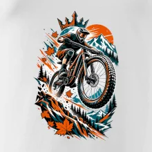 Listopadový horský cyklista při adrenalinovém skoku