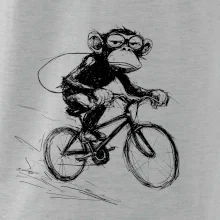 Opice s batohem na kole