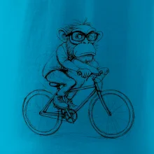 Opice s brýlemi na kole