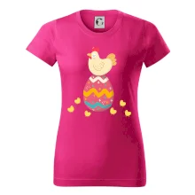 Slepice sedící na velikonočním vejci