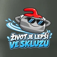 Stylový curlingový kámen ve skluzu