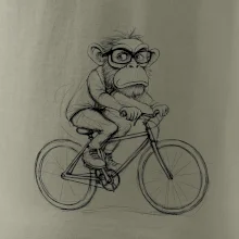 Opice s brýlemi na kole