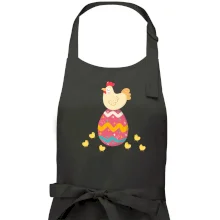 Slepice sedící na velikonočním vejci