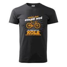 Starší muž - cyklista silniční kolo Starší muž - cyklista silniční kolo