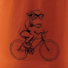 Opice s brýlemi na kole