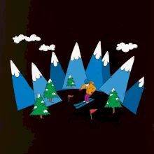 Lyžař a barevné hory