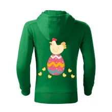 Slepice sedící na velikonočním vejci