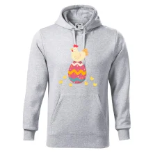 Slepice sedící na velikonočním vejci