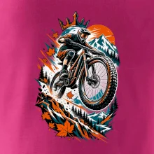 Listopadový horský cyklista při adrenalinovém skoku