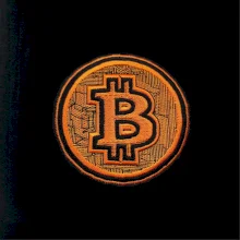 Logo bitcoin ve vyšívaném stylu