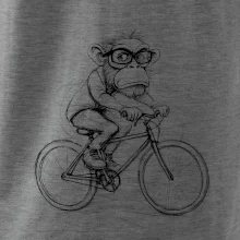 Opice s brýlemi na kole