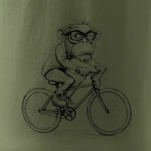 Opice s brýlemi na kole