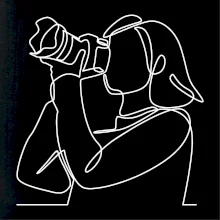 Fotografka stojící jedním tahem