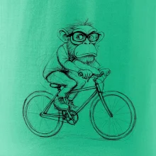 Opice s brýlemi na kole