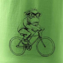 Opice s brýlemi na kole