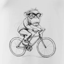 Opice s brýlemi na kole