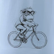 Opice s brýlemi na kole