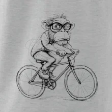 Opice s brýlemi na kole