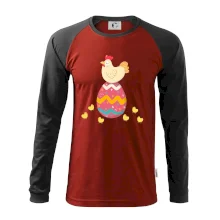 Slepice sedící na velikonočním vejci