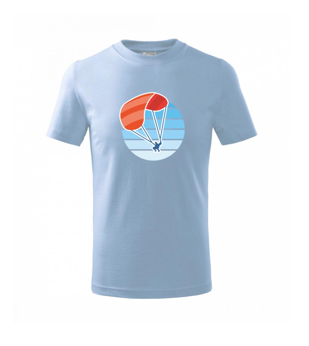 Paragliding oranžový v modrém kolečku
