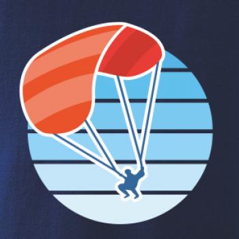 Paragliding oranžový v modrém kolečku