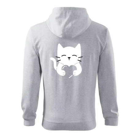 Kočka drží srdce