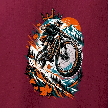 Listopadový horský cyklista při adrenalinovém skoku