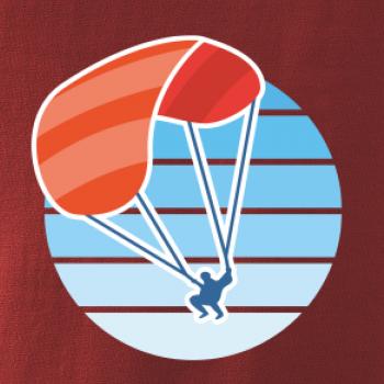 Paragliding oranžový v modrém kolečku